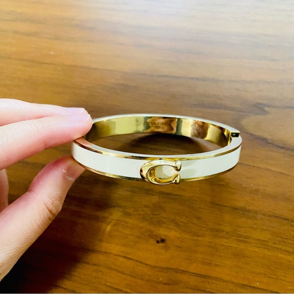 COACH Signature Push Hinged Bangle In Gold/cream Pink Style $128 - Picture 1 of 5